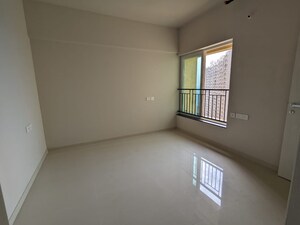 Room in 2 BHK Apartment at Rustomjee Urbania, Majiwada – for Rent