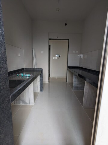 Kitchen in 2 BHK Apartment at Rustomjee Urbania, Majiwada – for Rent