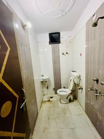 Bathroom in 3 BHK Apartment at Dwarka Mor – for Sale