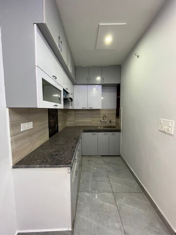 Kitchen in 2 BHK Builder Floor at Dwarka Mor – for Sale