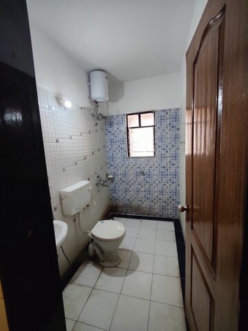 Bathroom in 3 BHK Apartment at Salunkhe Vihar Society – for Rent