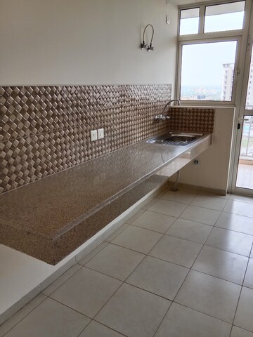 Kitchen in 3 BHK Apartment at Paras Dews, Sector 106 – for Sale
