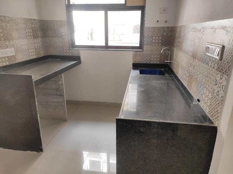 Kitchen, happy-sarvoday-greens 2 Bedroom 842 Sq.Ft. Apartment In Bhadwad Gaon Thane 6291341