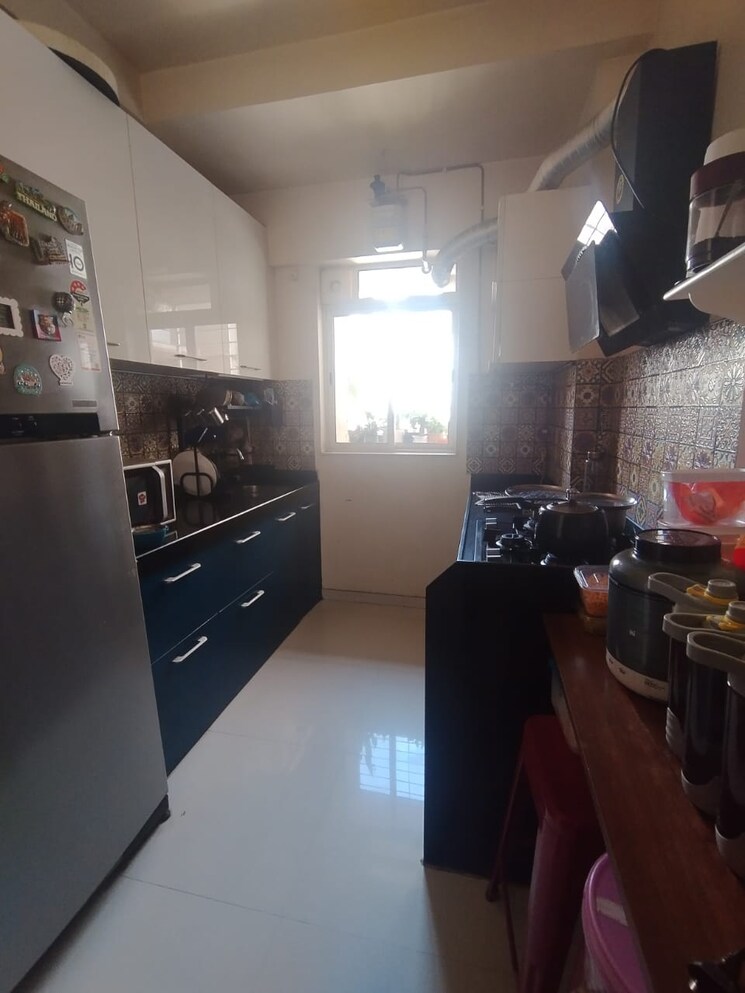 Kitchen, lodha-amara 3 Bedroom 955 Sq.Ft. Apartment In Kolshet Road Thane 6295707