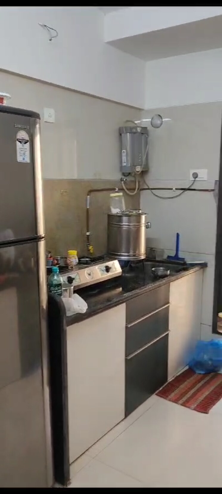 Kitchen, unique-greens-ghodbunder-road 2 Bedroom 619 Sq.Ft. Apartment In Ghodbunder Road Thane 6301548