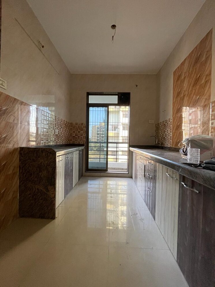 Kitchen, tanna-mangeshi-dazzle-iii 3 Bedroom 1250 Sq.Ft. Apartment In Thakurli Thane 6304096