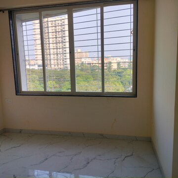 Room in 2.5 BHK Apartment at Tattva Mittal Cove, Andheri West – for Rent