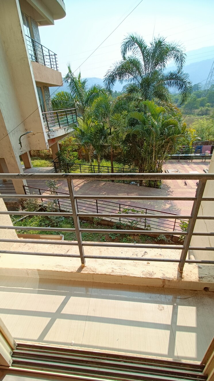 Balcony, rajwada-neral-matheran-residency 1 Bedroom 546 Sq.Ft. Apartment In Neral Navi Mumbai 6311362