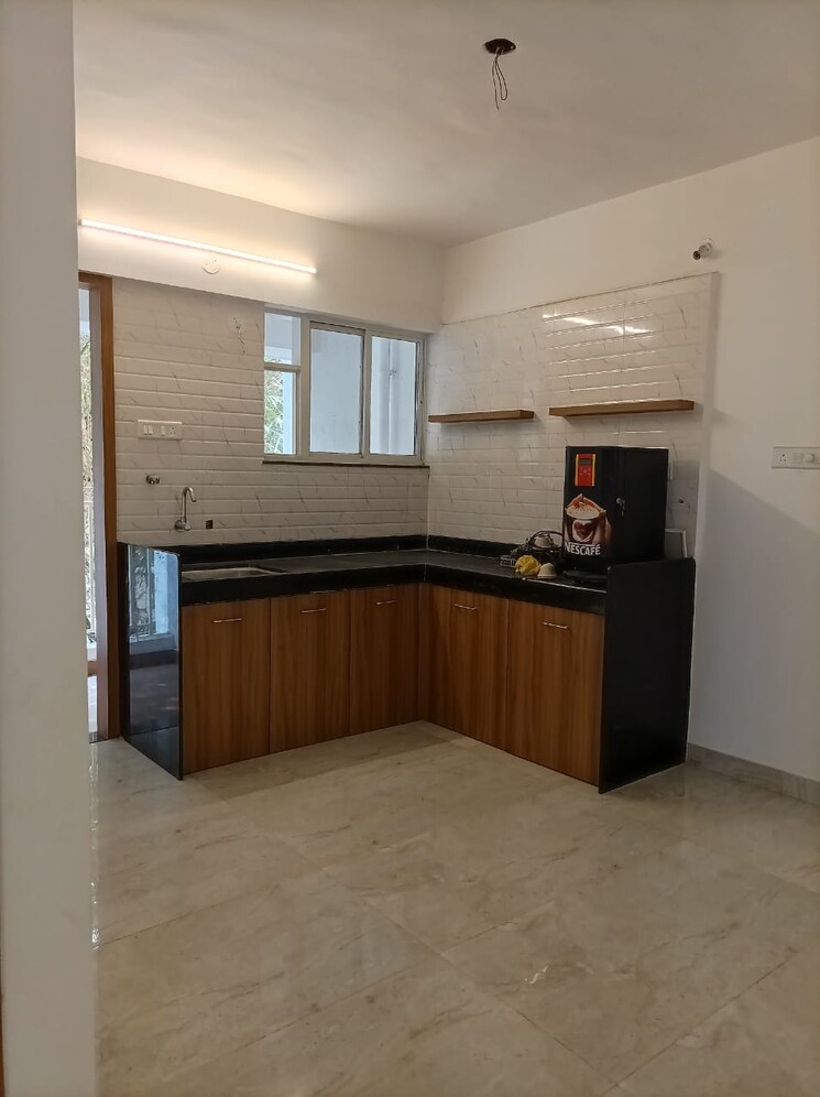 Kitchen, green-mint 2 Bedroom 774 Sq.Ft. Apartment In Sus Pune 6320514