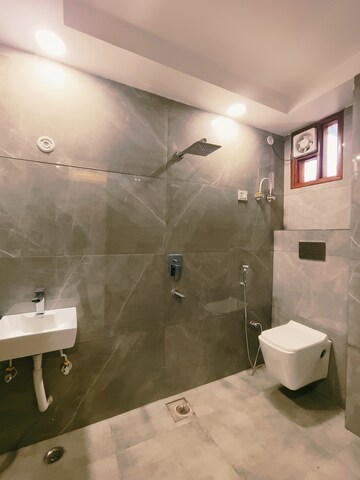 Bathroom in 4 BHK Builder Floor at Dwarka Mor – for Sale