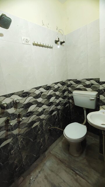 Bathroom in 3 BHK Builder Floor at Dwarka Mor – for Rent