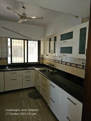 Kitchen in 3 BHK Penthouse at Green Valley CHS, Wanwadi – for Sale