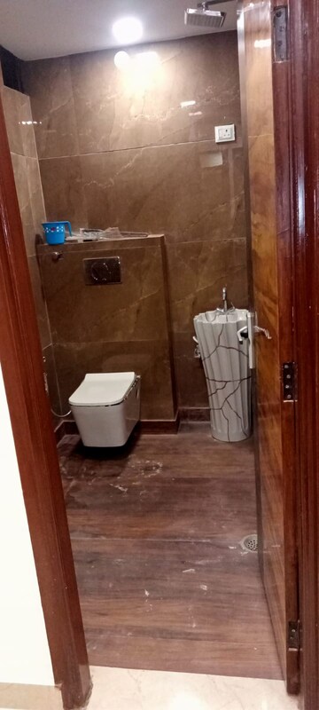 Bathroom in 3 BHK Apartment at Dwarka Mor – for Rent