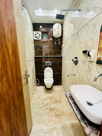 Bathroom in 2 BHK Apartment at Dwarka Mor – for Sale