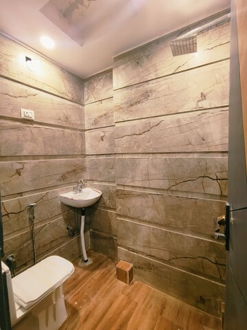 Bathroom in 2 BHK Builder Floor at Dwarka Mor – for Sale