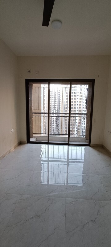 Room in 1 BHK Apartment at Sunteck West World, Naigaon East – for Sale