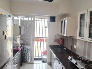 Kitchen in 2 BHK Apartment at Courtyard by Narang Realty and The Wadhwa Group, Pokhran Road No Two – for Rent