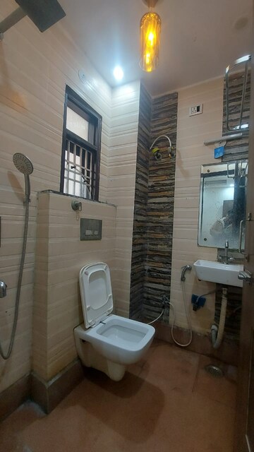 Bathroom in 2 BHK Apartment at Dwarka Mor – for Rent