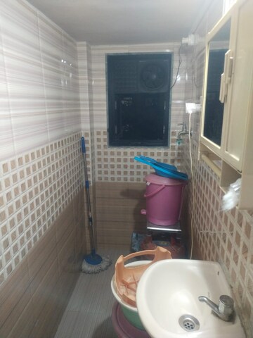 Bathroom in 1 BHK Apartment at Kharigaon – for Sale