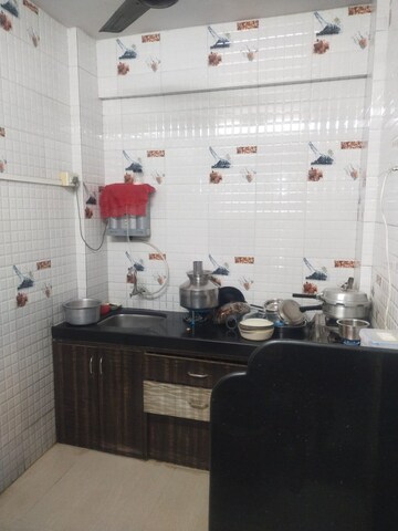 Kitchen in 1 BHK Apartment at Kharigaon – for Sale
