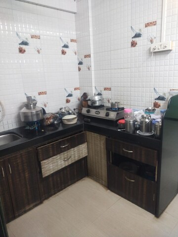 Kitchen in 1 BHK Apartment at Kharigaon – for Sale