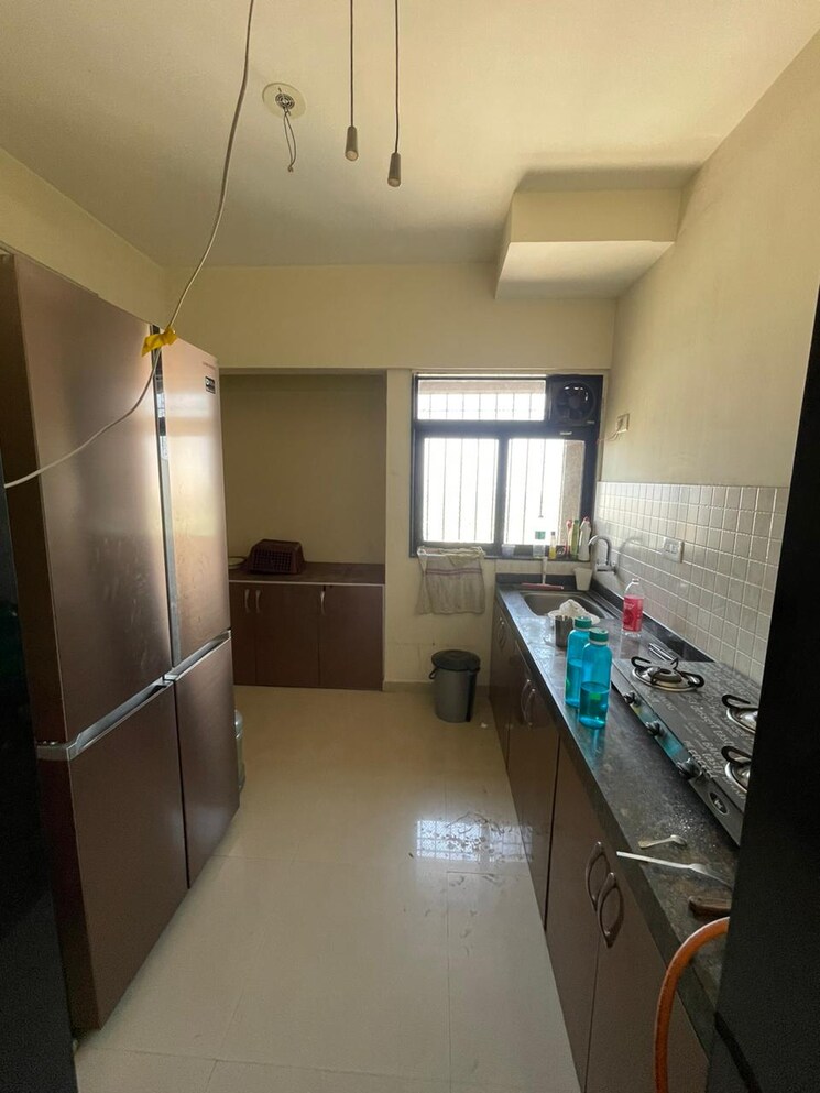 Kitchen, dosti-planet-north-emerald 2 Bedroom 929 Sq.Ft. Apartment In Shilphata Thane 6432765
