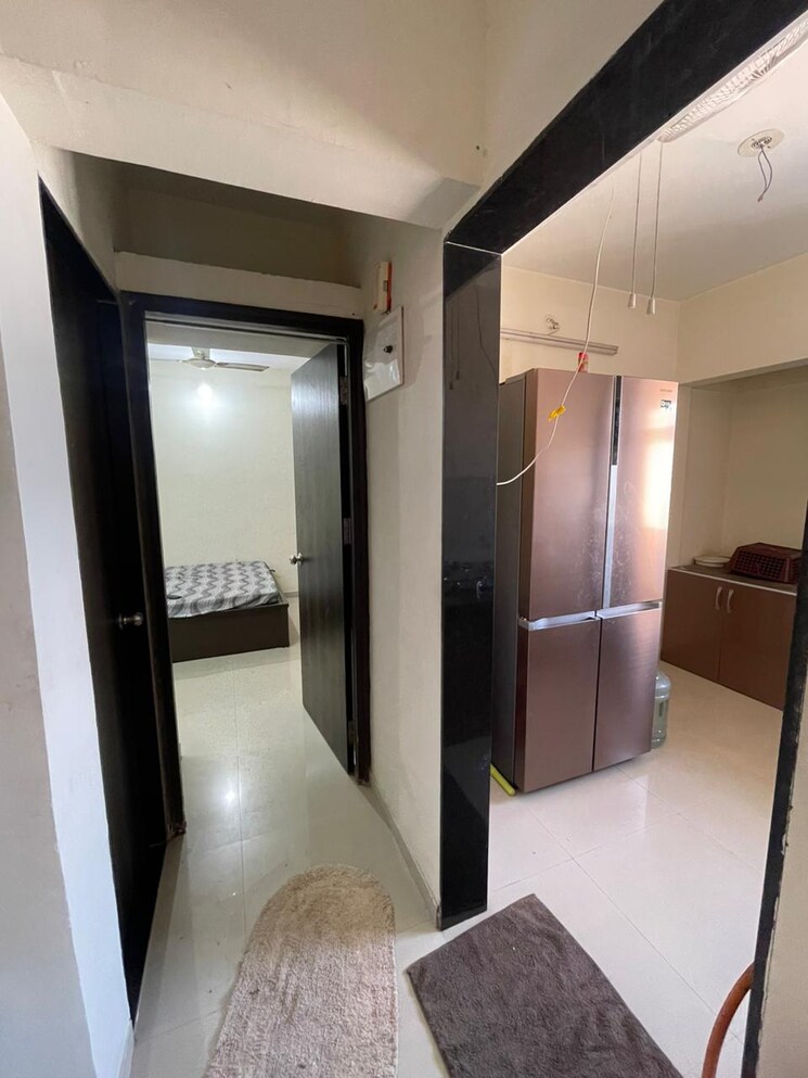 Living Room, dosti-planet-north-emerald 2 Bedroom 929 Sq.Ft. Apartment In Shilphata Thane 6432765