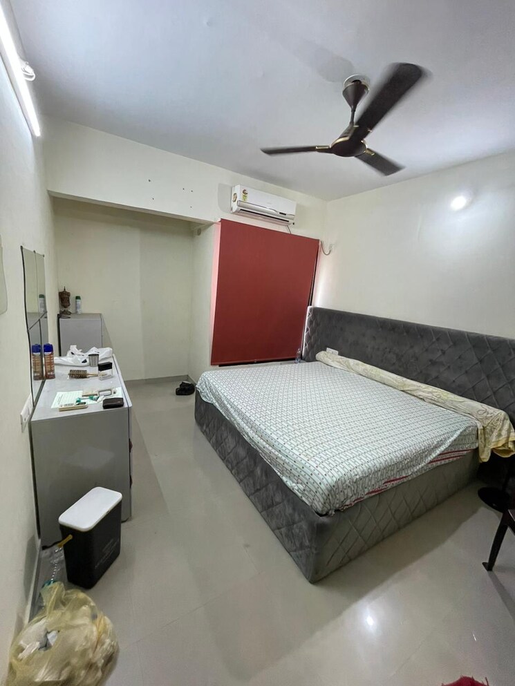 Master Bedroom, dosti-planet-north-emerald 2 Bedroom 929 Sq.Ft. Apartment In Shilphata Thane 6432765