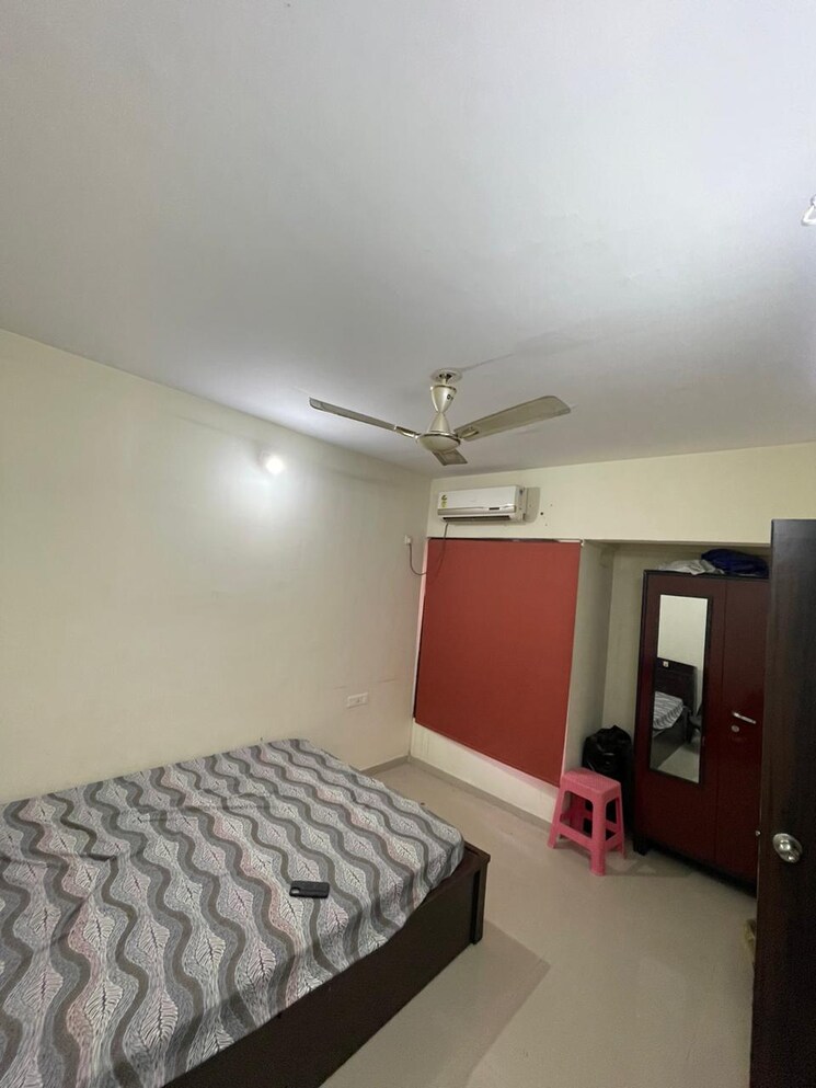 Bedroom, dosti-planet-north-emerald 2 Bedroom 929 Sq.Ft. Apartment In Shilphata Thane 6432765