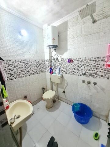 Bathroom in 2 BHK Builder Floor at Dwarka Mor – for Sale