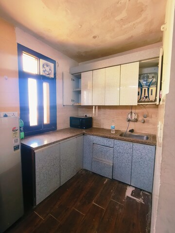 Kitchen in 2 BHK Apartment at Dwarka Mor – for Rent