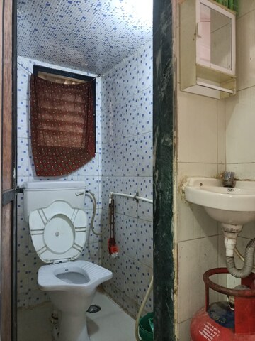 Bathroom in 1 BHK Apartment at Kharigaon – for Sale