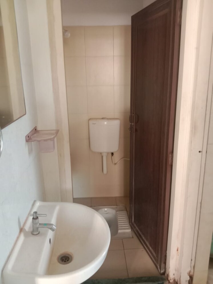 Bathroom, puranik-city 1 Bedroom 411 Sq.Ft. Apartment In Kasarvadavali Thane 6458364