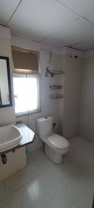Bathroom in 3.5 BHK Apartment at Amrapali Eden Park, Sector 50 – for Sale