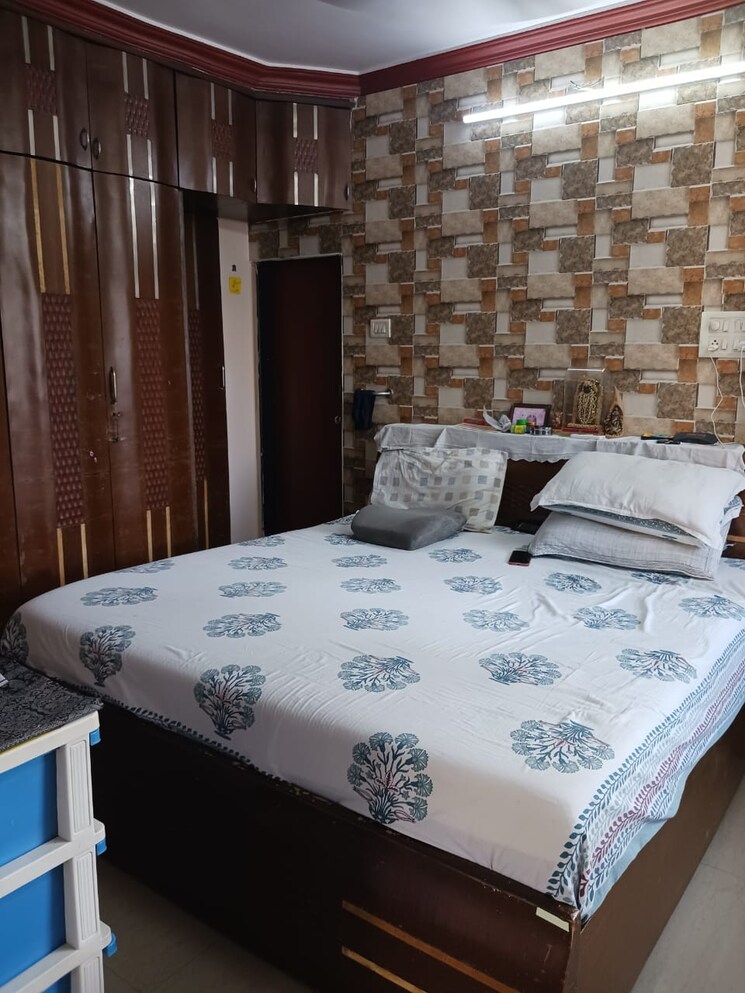 Bedroom, the-blossom-apartment 2 Bedroom 810 Sq.Ft. Apartment In Mahavir Nagar Mumbai 6469665