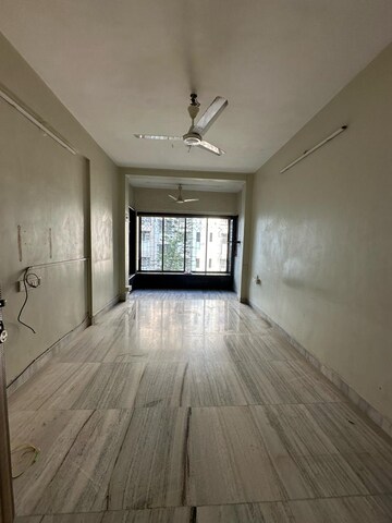 Room in 1 BHK Apartment at Abhar CHS, Andheri West – for Rent