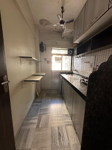 Kitchen in 1 BHK Apartment at Abhar CHS, Andheri West – for Rent