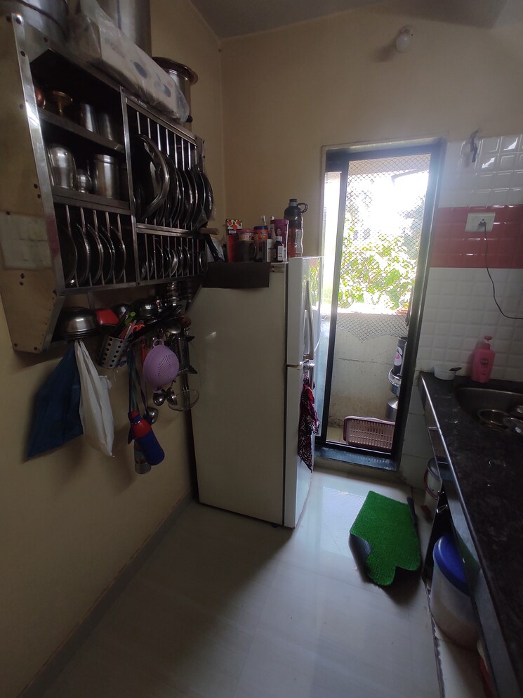 Kitchen, om-ganesh-chs-bhayander-east 1 Bedroom 600 Sq.Ft. Apartment In Bhayandar East Thane 6486309