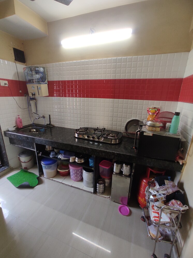 Kitchen, om-ganesh-chs-bhayander-east 1 Bedroom 600 Sq.Ft. Apartment In Bhayandar East Thane 6486309