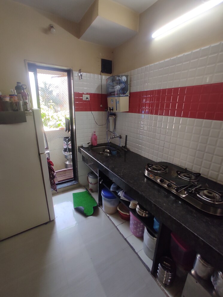 Kitchen, om-ganesh-chs-bhayander-east 1 Bedroom 600 Sq.Ft. Apartment In Bhayandar East Thane 6486309