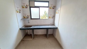 Kitchen in 1 BHK Builder Floor at Rose Nagar CHS, Naigaon West – for Sale