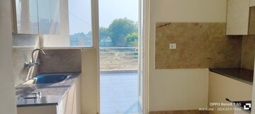 Kitchen in 2 BHK Apartment at Adore Happy Homes, Sector 86 – for Sale
