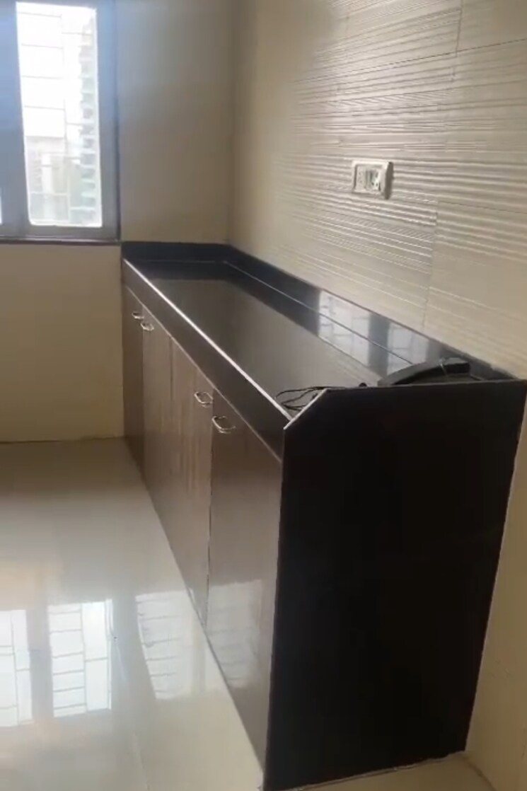 Kitchen, cosmos-classique 2 Bedroom 686 Sq.Ft. Apartment In Ghodbunder Road Thane 6510357