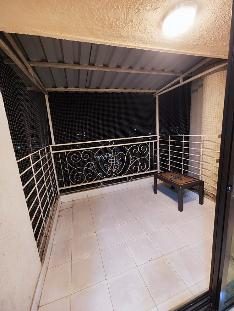 Balcony, cosmos-angel 3 Bedroom 929 Sq.Ft. Apartment In Owale Thane 6510425