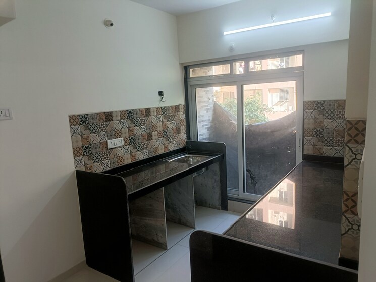 Kitchen, cosmos-enclave 2 Bedroom 648 Sq.Ft. Apartment In Kasarvadavali Thane 6514143