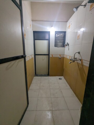 Bathroom in 1 BHK Apartment at Manikchand Apartment, Kalwa – for Rent
