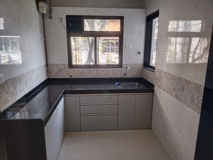 Kitchen, aditya-laxmi-keshav 3 Bedroom 900 Sq.Ft. Apartment In Naupada Thane 6530959