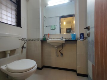 Bathroom in 2 BHK Apartment at Sheth Fiona, Pokhran Road No 2 – for Sale