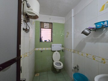 Bathroom in 1 BHK Apartment at Vasant Fiona, Pokhran Road No 2 – for Rent