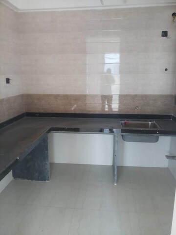 Kitchen in 2 BHK Apartment at Nirman Aura, Ambegaon Budruk – for Rent